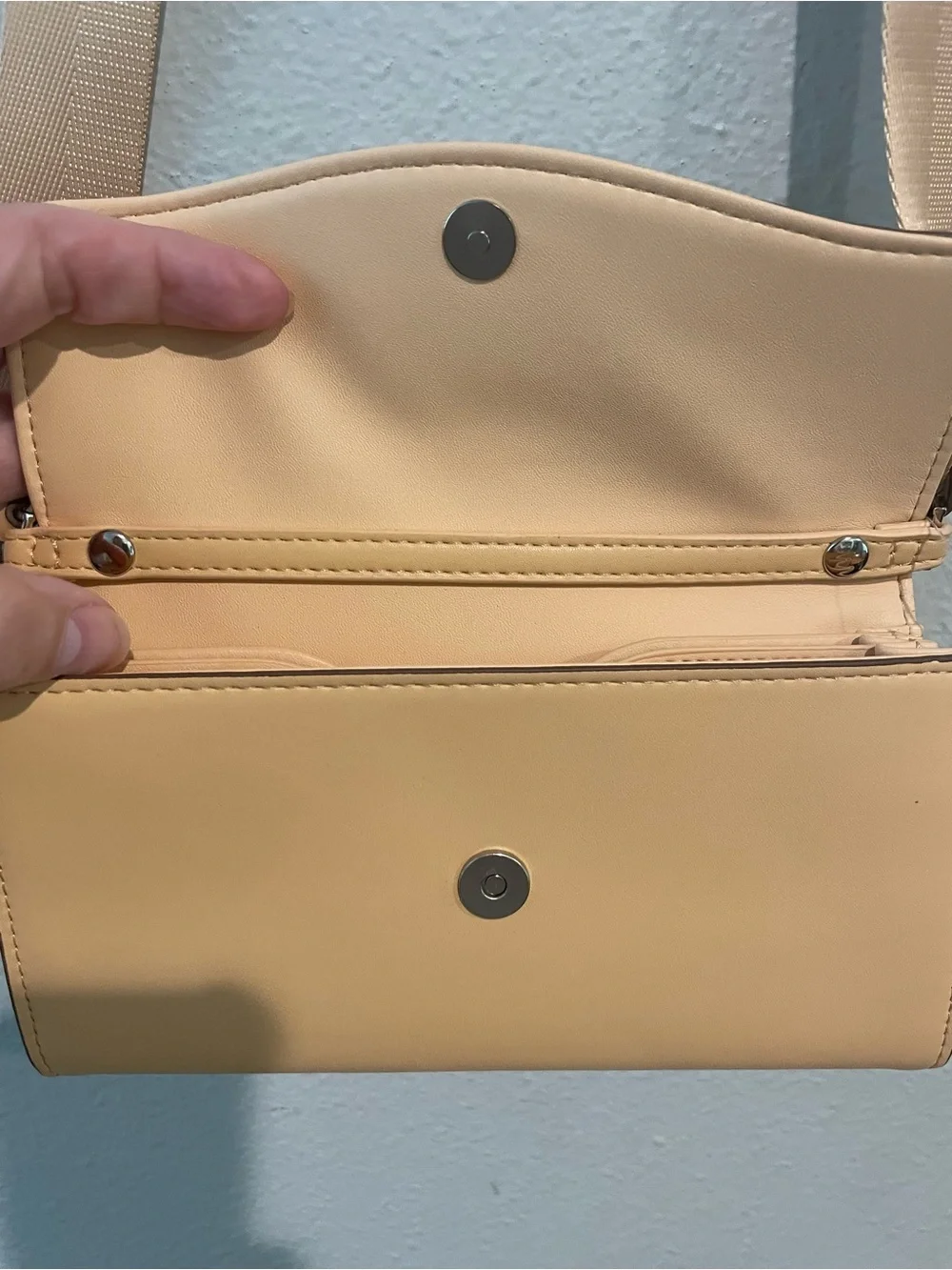 a new day cream crossbody